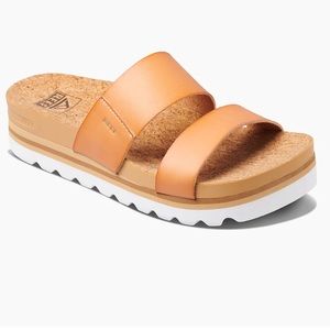 Size 10 gently used. Worn once.  Reef platform sandals in tan